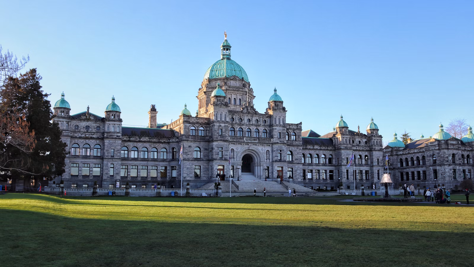 The BC Legislature building in Victoria under a clear blue sky